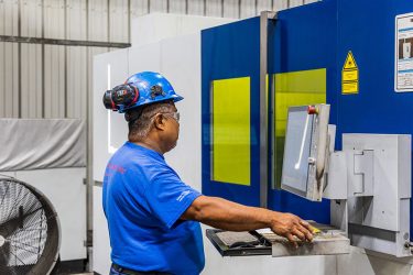 Machine operator working evening shift in our manufacturing facility. Now hiring 2nd and 3rd shift machine operators in Toledo and Cincinnati, Ohio.